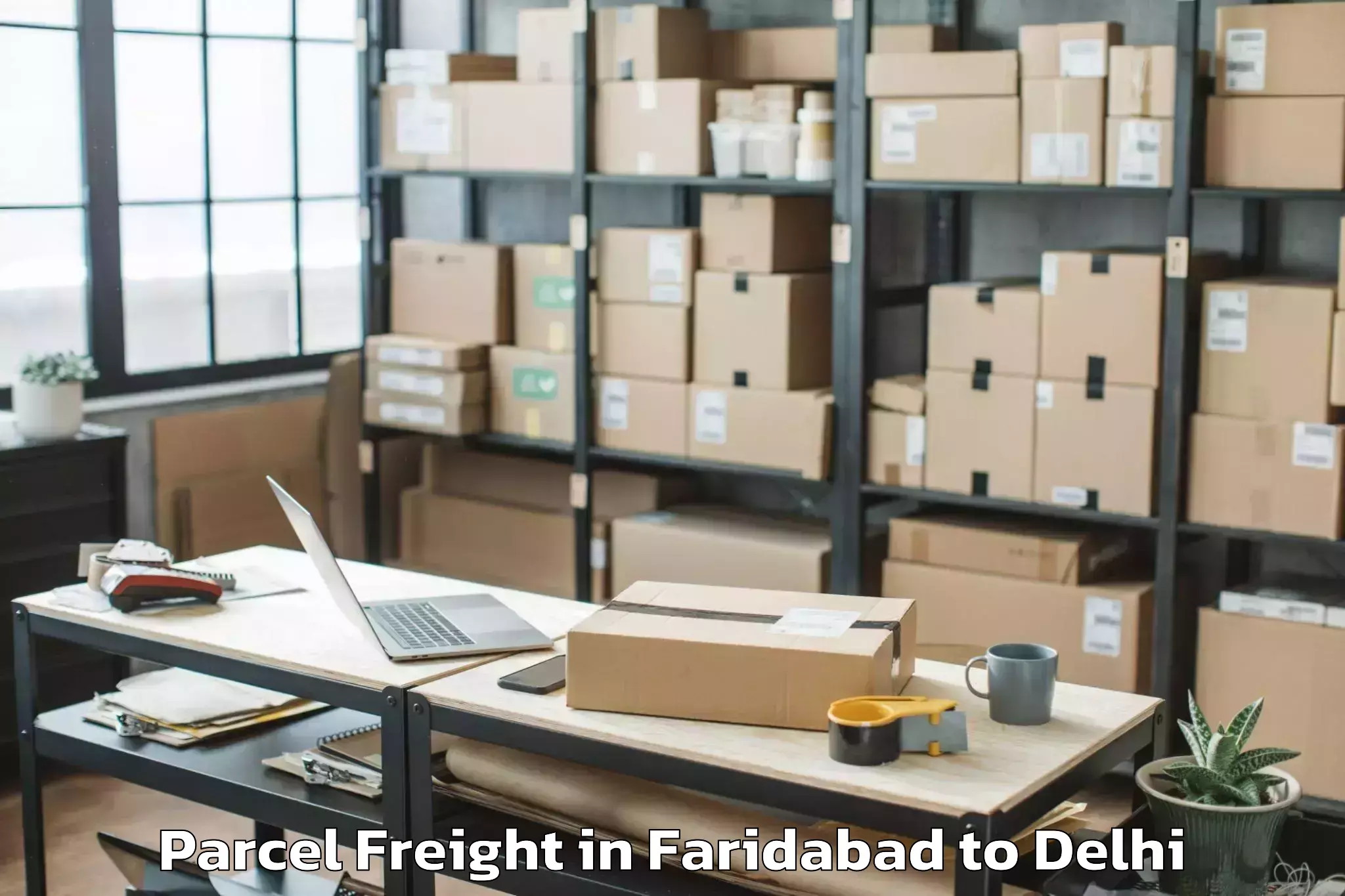 Faridabad to Parsvnath Mall Azadpur Parcel Freight Booking